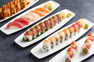 Four plates of delicious fresh sushi